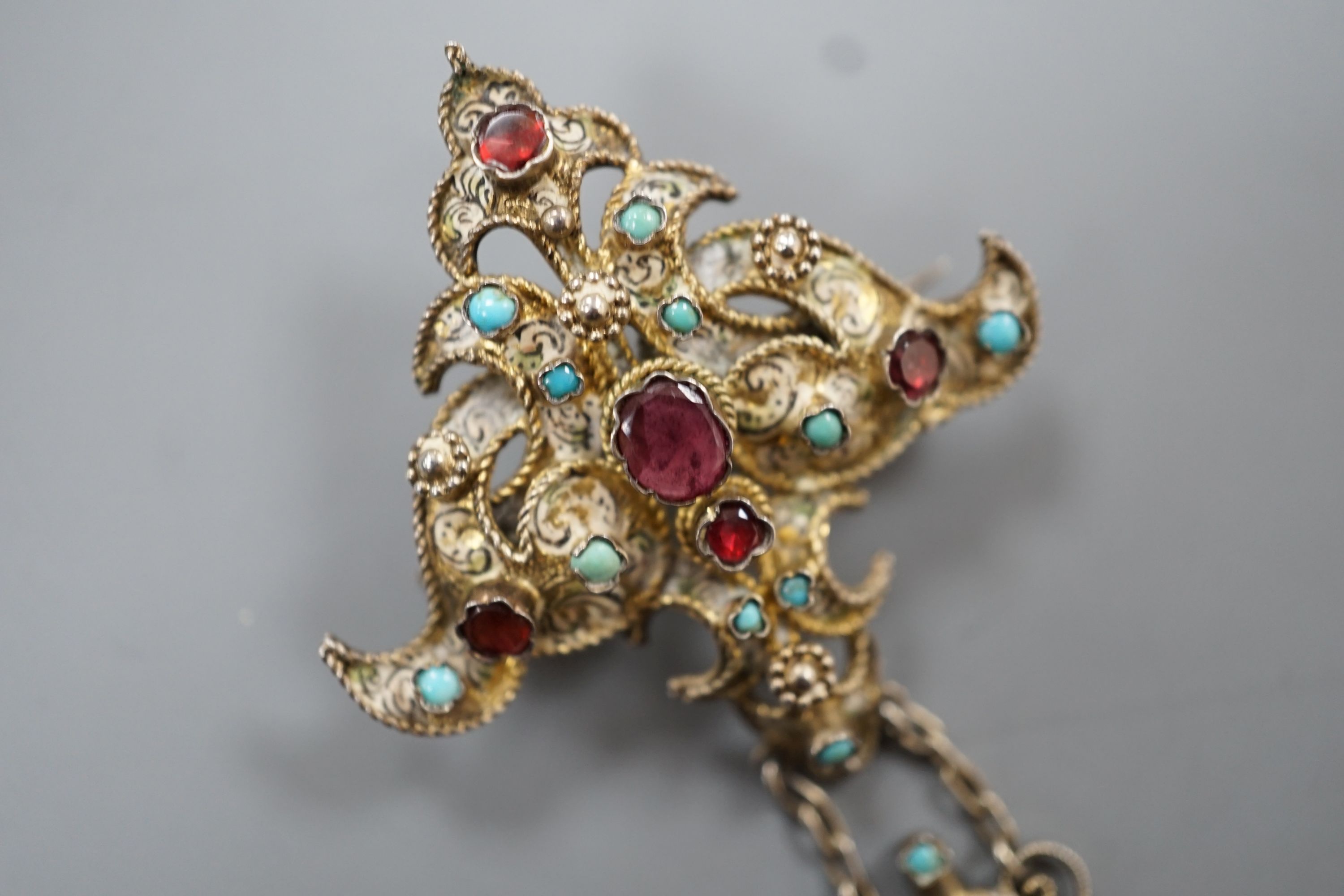 A 19th century Austro-Hungarian gilt white metal and semi-precious gem set drop brooch, 6cm.